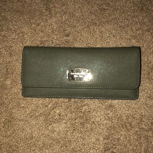 Micheal Kors Olive green wallet.